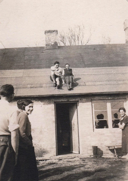 Erna Weinert and H. Finkelstein on the roof of the Kibbutz, 1936.